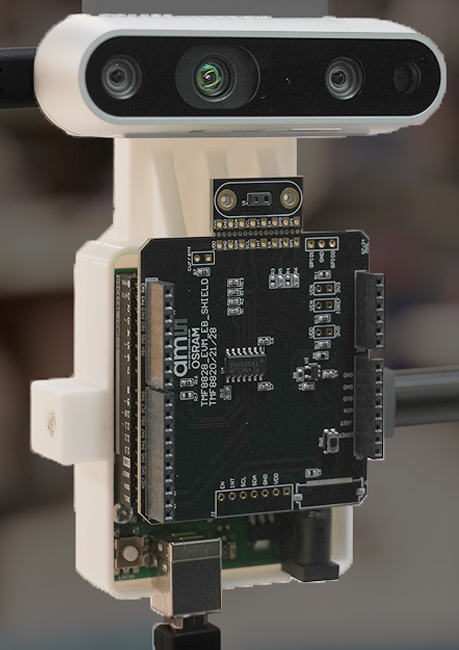 The built TMF8828 and Intel RealSense capture rig